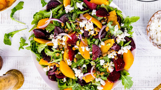 Beet salad with greens in a large bowl